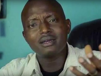 Pastor Aloysius Bugingo of the House of Prayer Ministries in Kampala, Uganda. (Screenshot from YouTube)
