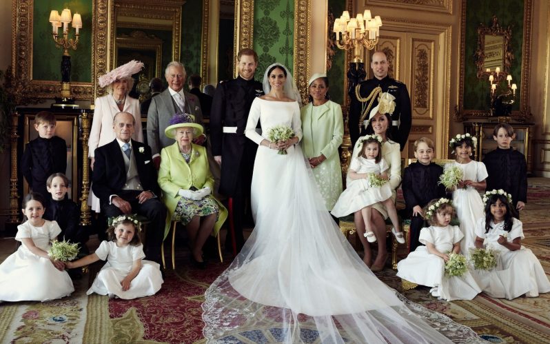 The Duke and Duchess of Sussex pose with their families and wedding party members in the Green Drawing Room at Windsor Castle on May 19. (Alexi Lubomirski/Duke and Duchess of Sussex/Getty Images)