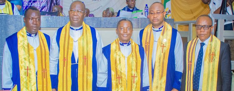 The ECWA Headquarter Executives from Left to Right, ECWA Assistant General Secretary, Rev. Alex Tsokwa Ibi | ECWA Vice President, Rev. Dr. John Aina Omba | ECWA President, Rev. Stephen Panya Baba | ECWA General Secretary, Rev. Yunusa Sabo Nmadu Jnr. Fips | ECWA Treasurer, Dr. Kalu Umeh The ECWA Headquarter Executives from Left to Right, ECWA Assistant General Secretary, Rev. Alex Tsokwa Ibi | ECWA Vice President, Rev. Dr. John Aina Omba | ECWA President, Rev. Stephen Panya Baba | ECWA General Secretary, Rev. Yunusa Sabo Nmadu Jnr. Fips | ECWA Treasurer, Dr. Kalu Umeh