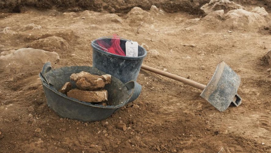 Unearthing ancient pottery, Photo, CBN News, Jonathan Goff