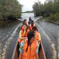 Students canoeing - Nzulezo, Ghana - The village on stilts