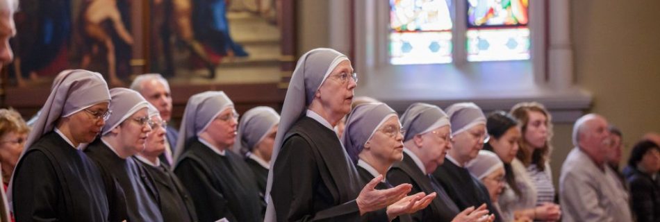 Members of the Little Sisters of the Poor pray during Mass at the Basilica of the Sacred Heart at the University of Notre Dame in Indiana April 9, 2016. (Credit: CNS photo/Peter Ringenberg, Notre Dame Center for Ethics and Culture).