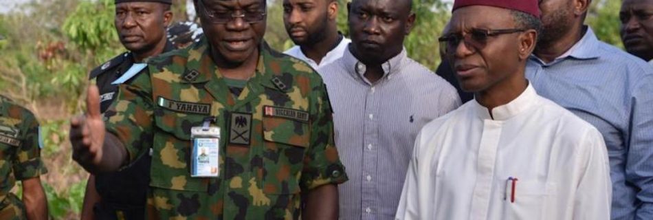 Kaduna State Governor Nasir Elrufai with security operatives during the visit to Kajuru community