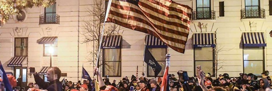 Supporters of President Donald Trump wave a Betsy Ross flag with a circle of 13 five-point stars representing the 13 original colonies flies during a protest Dec. 12 in Washington (© Stephanie Keith/Getty Images)