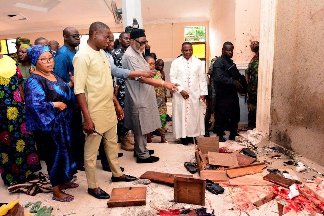 Ondo State governor Rotimi Akeredolu (3rd L) called it a “vile and satanic attack” (Image source: AFP)